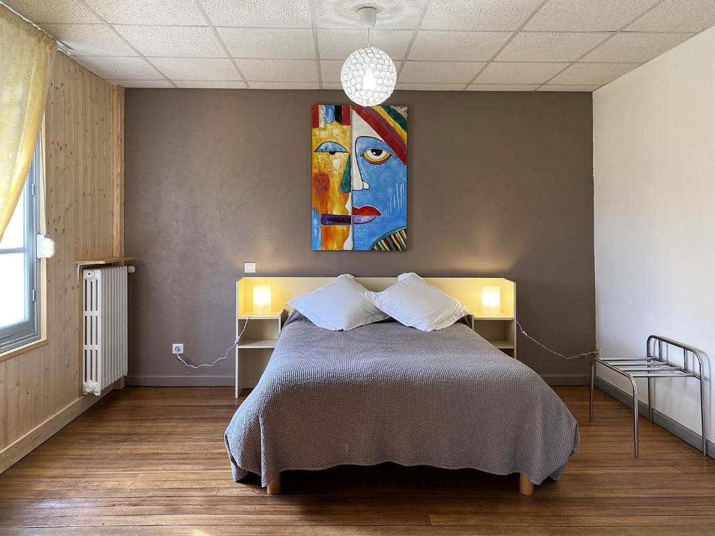 Postel nebo postele na pokoji v ubytování Hôtel l'Annexe