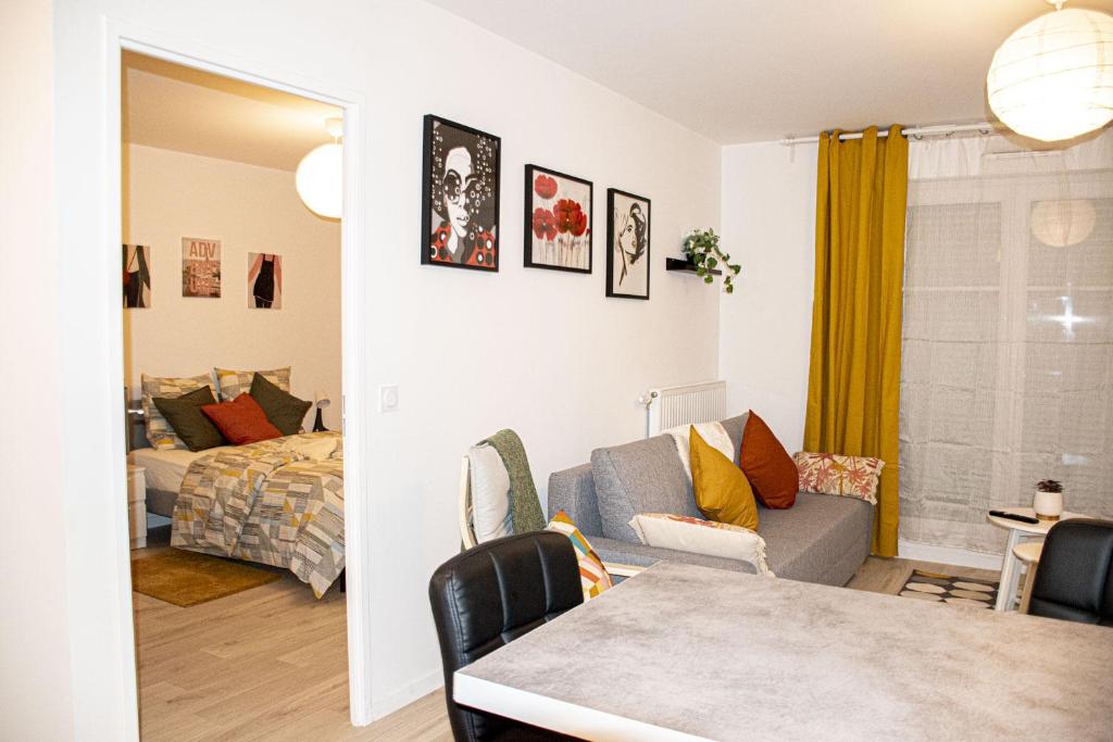 Posteľ alebo postele v izbe v ubytovaní Superbe appartement entre Paris et Disneyland