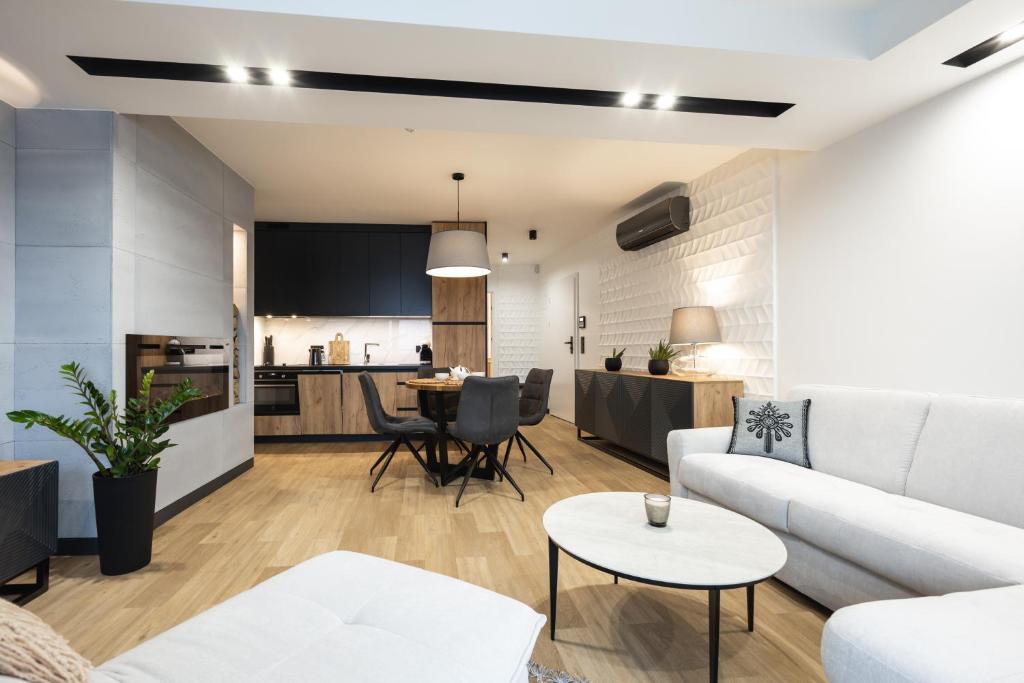 Posezení v ubytování Mountain Apartments Butorowy Sauna Residence