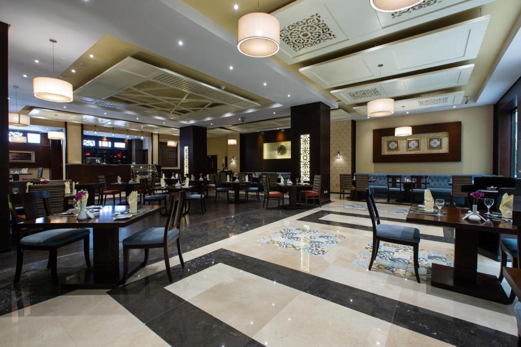 Restaurace v ubytování Triumph Plaza Hotel