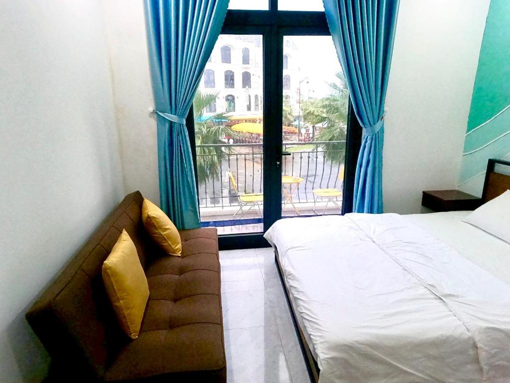 Postel nebo postele na pokoji v ubytování Lex Homestay Hotel
