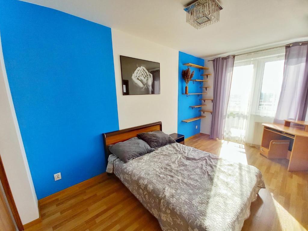 Posteľ alebo postele v izbe v ubytovaní Apartament Krokus