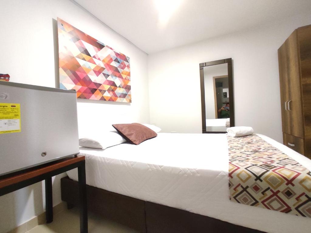 Postel nebo postele na pokoji v ubytování Walena Hotel