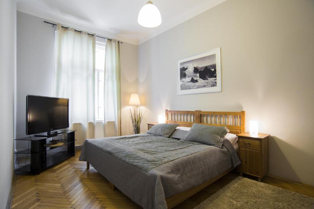Ένα ή περισσότερα κρεβάτια σε δωμάτιο στο Apartment Dusni