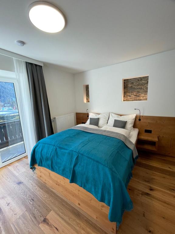 Postel nebo postele na pokoji v ubytování appartementsKOFLER