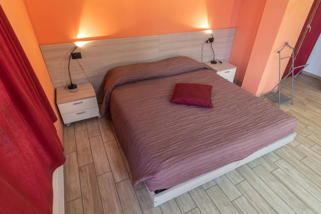 Postel nebo postele na pokoji v ubytování B&B Alla Roggetta