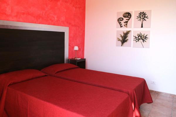 Postel nebo postele na pokoji v ubytování B&B Villa Francesco