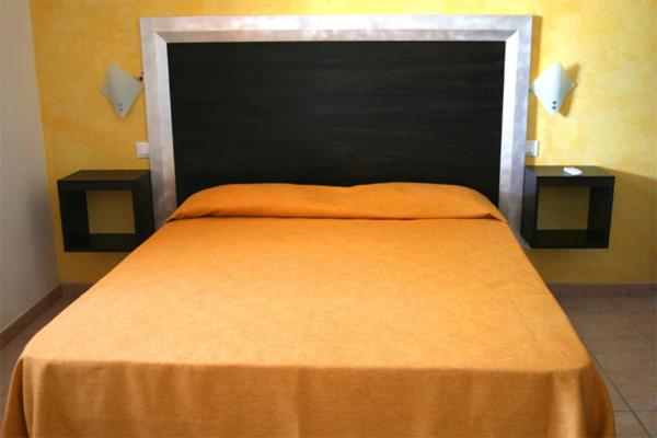 Postel nebo postele na pokoji v ubytování B&B Villa Francesco