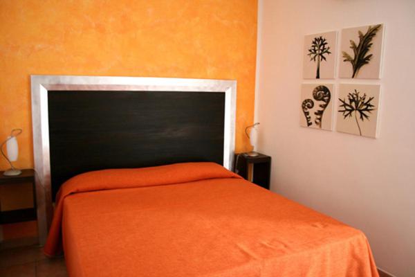 Postel nebo postele na pokoji v ubytování B&B Villa Francesco
