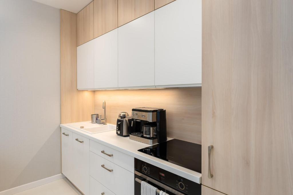 Kuchnia lub aneks kuchenny w obiekcie Sunrise Apartament