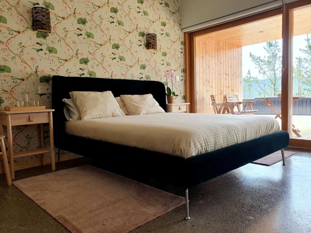 Postel nebo postele na pokoji v ubytování Agroturismo Azkarraga