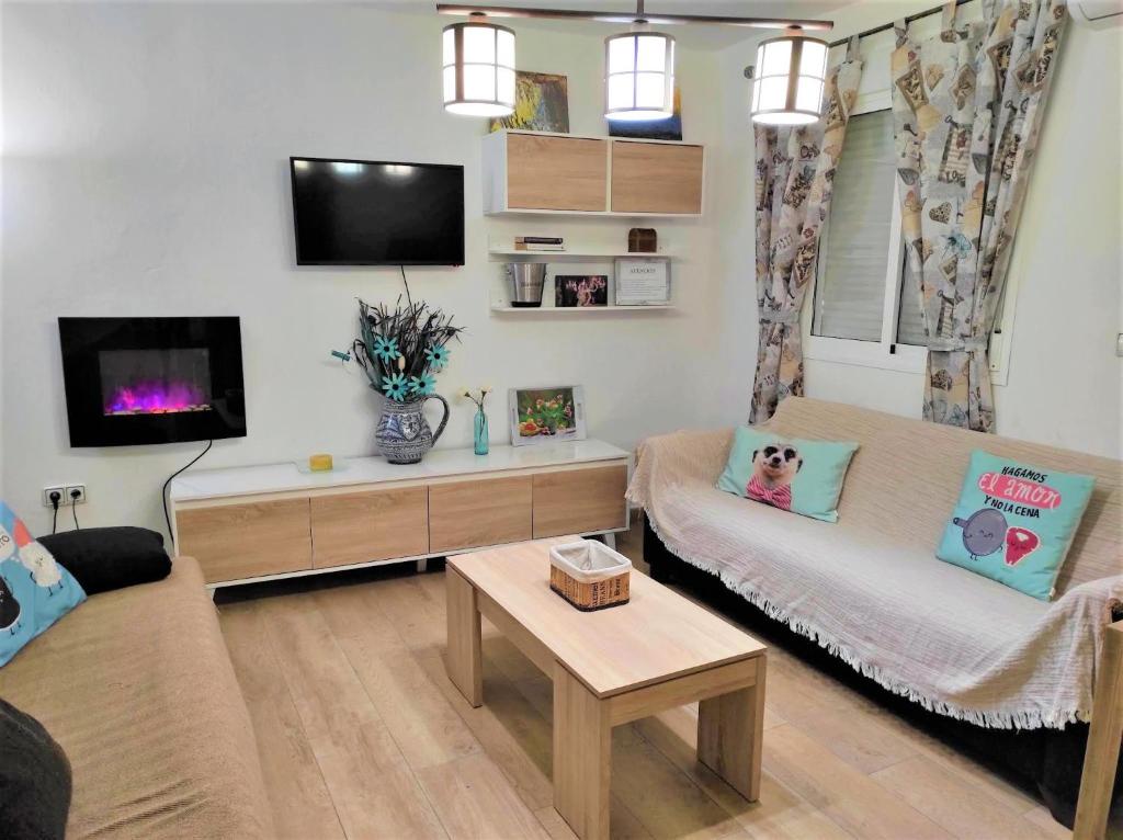 TV a/nebo společenská místnost v ubytování La Villa