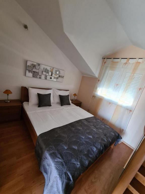 Postel nebo postele na pokoji v ubytování Villa Neda
