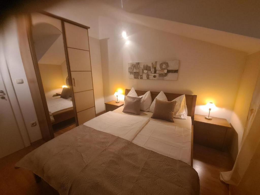 Postel nebo postele na pokoji v ubytování Villa Neda