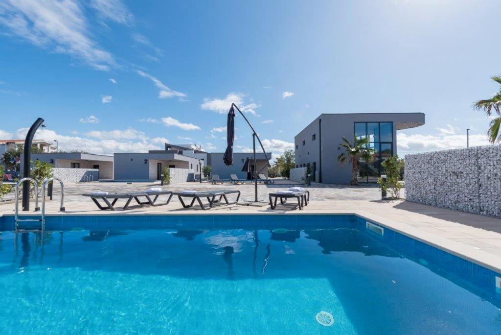 Bazén v ubytování More Exclusive Villas and Spa nebo v jeho okolí