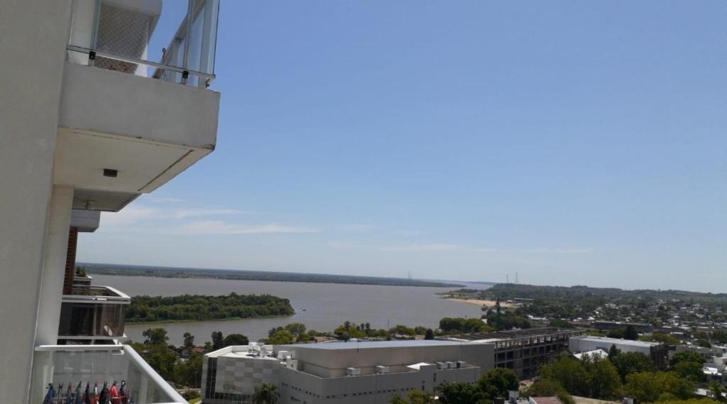 a view of a river from the balcony of a building at Gaudium in Paraná