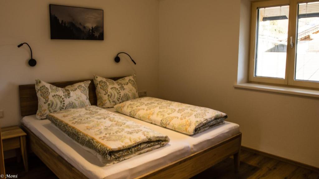 Postel nebo postele na pokoji v ubytování Haus Timmler