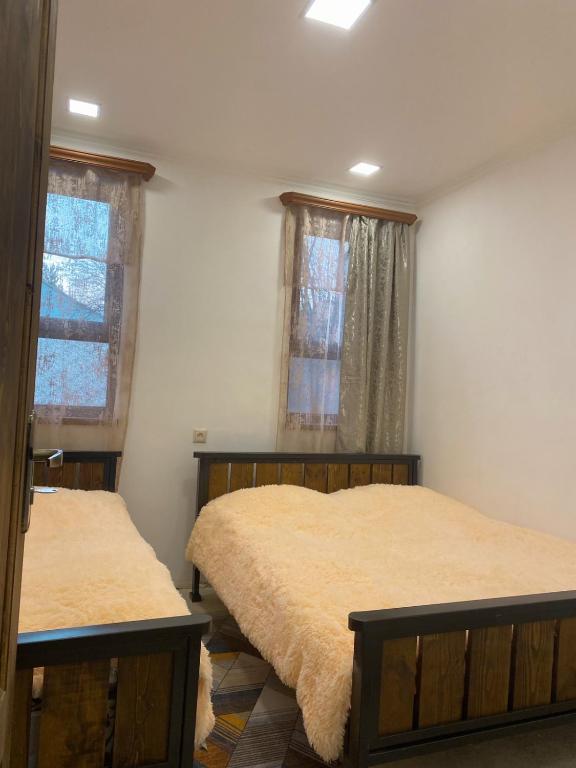 Postel nebo postele na pokoji v ubytování Paloma Inn Dilijan