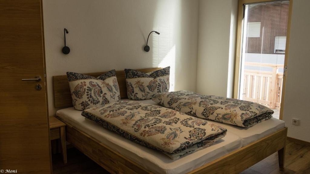 Postel nebo postele na pokoji v ubytování Haus Timmler