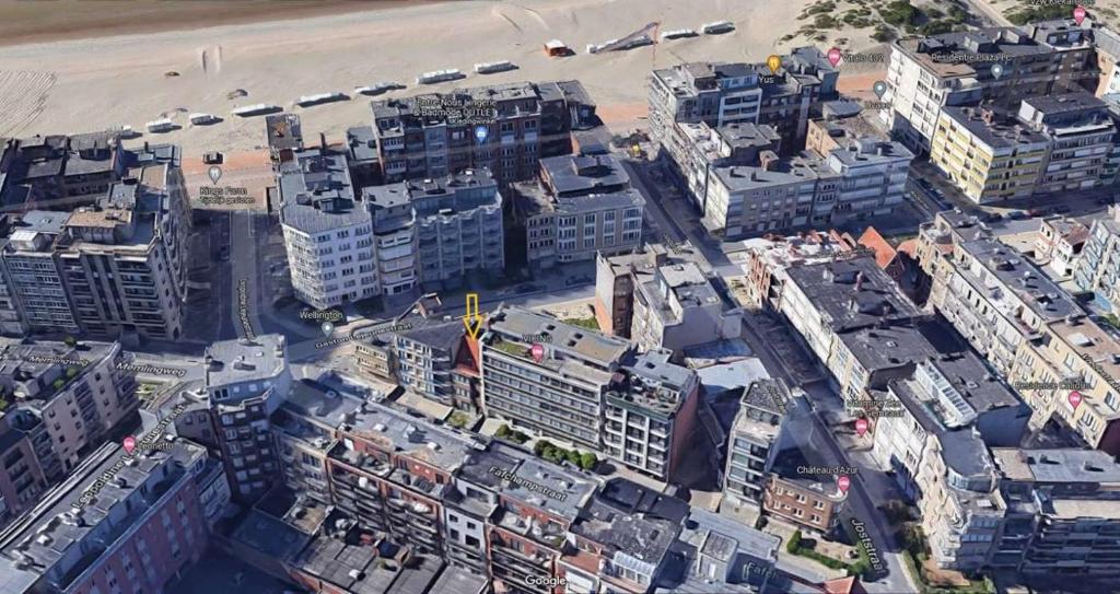 an aerial view of a city with tall buildings at ebbe&vloed in Koksijde