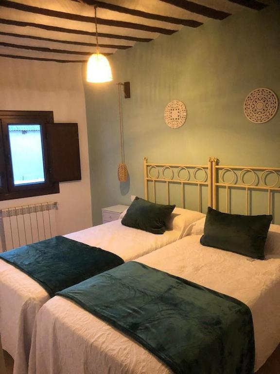 Posteľ alebo postele v izbe v ubytovaní Casa Rural La Labranza