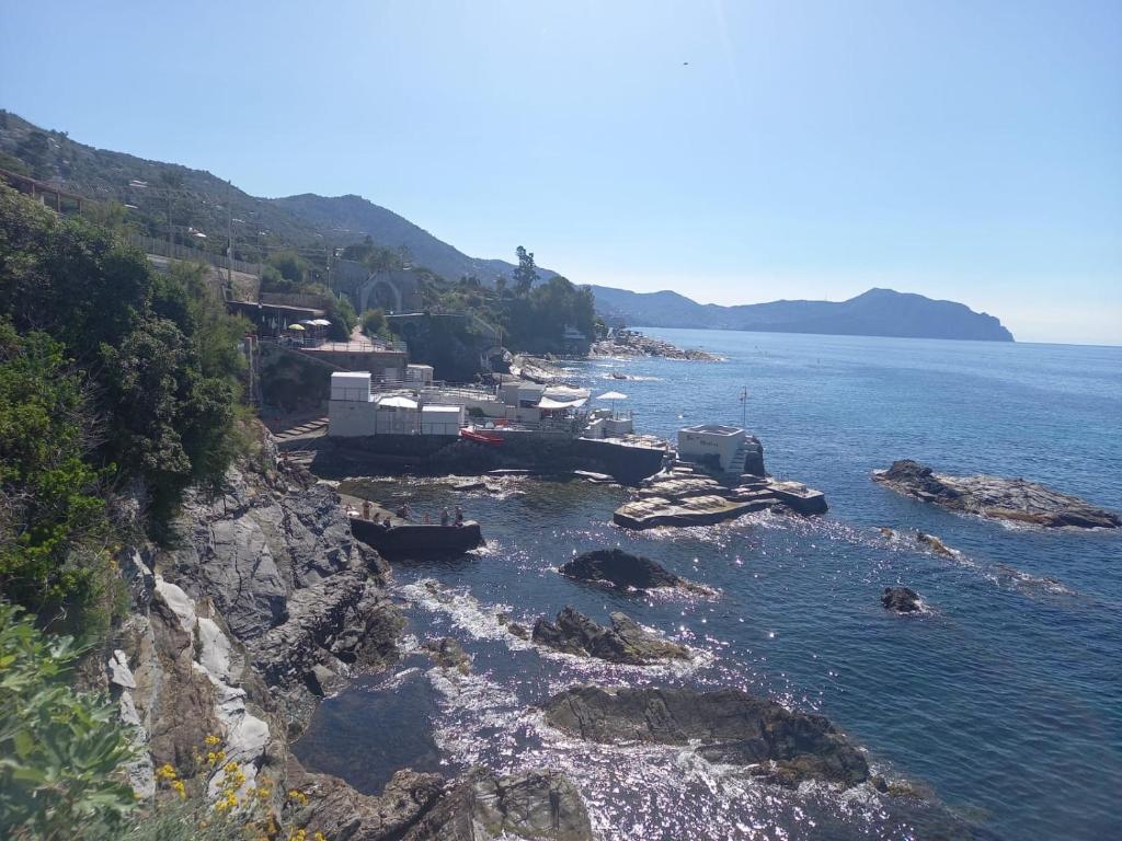 an aerial view of a body of water with boats at Casa mia a Nervi in Genoa