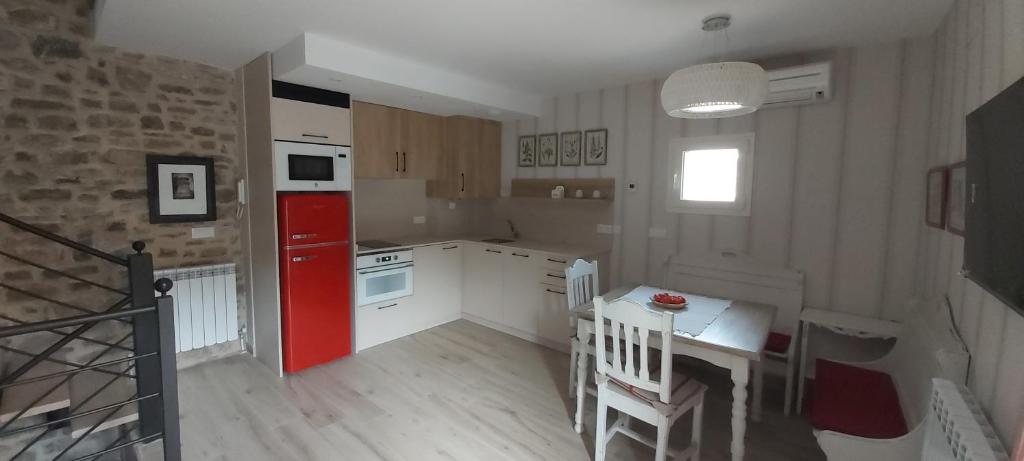 Kuchyň nebo kuchyňský kout v ubytování Apartamentos Casa Isabale