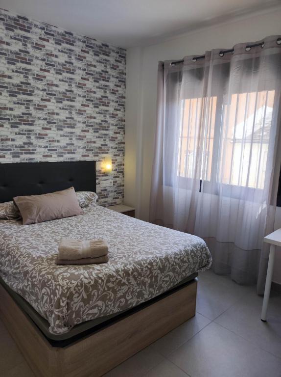 Postel nebo postele na pokoji v ubytování Remanso Urbano 2