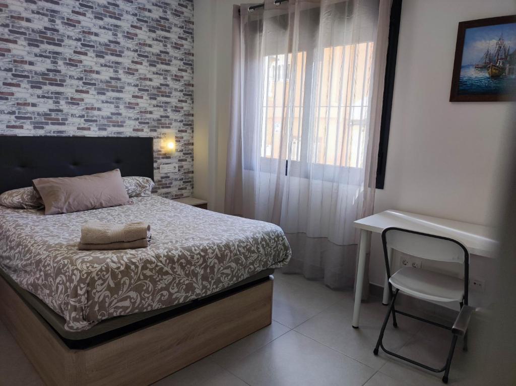 Postel nebo postele na pokoji v ubytování Remanso Urbano 2
