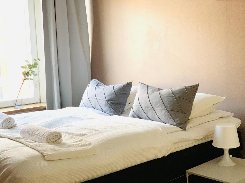 Postel nebo postele na pokoji v ubytování City Home Finland Sauna Apartment – One Bedroom, Sauna and Perfect Location in Downtown of Tampere