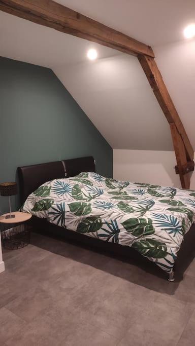 Posteľ alebo postele v izbe v ubytovaní Gîte paisible en campagne
