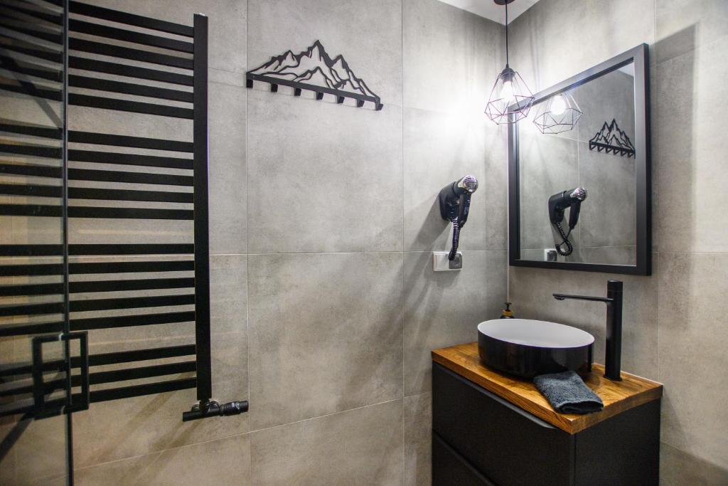 Kúpeľňa v ubytovaní Apartament Stryszek Alpinistyczny