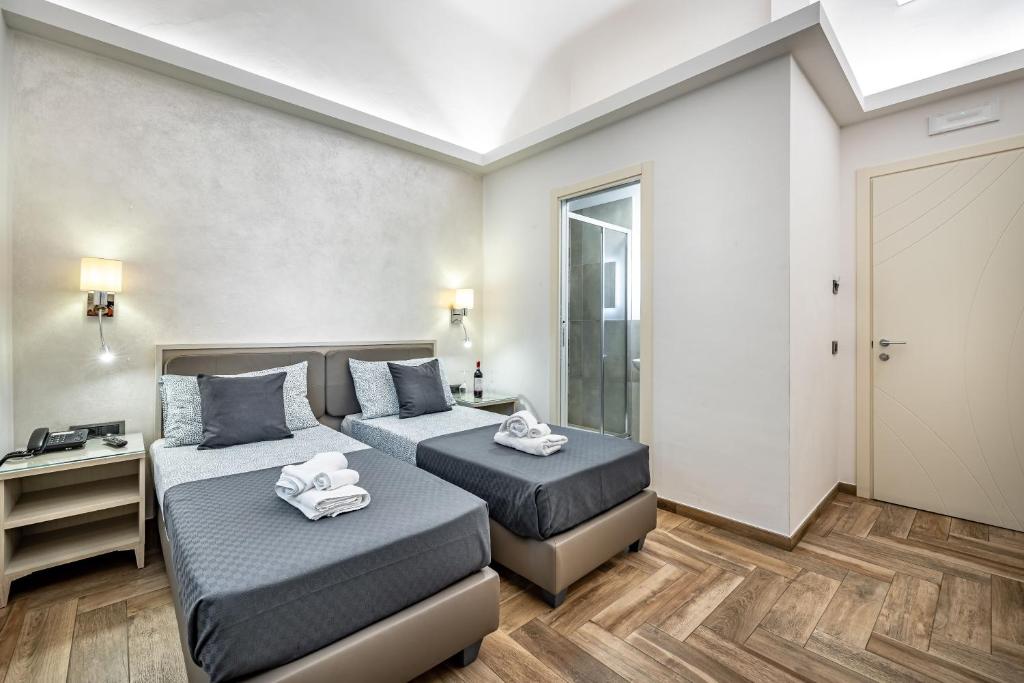 Postel nebo postele na pokoji v ubytování B&B Lorenzo de' Medici