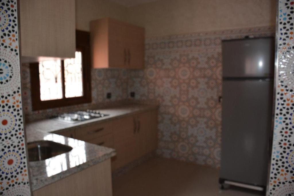 Kuchyň nebo kuchyňský kout v ubytování Ozoud high standing appartment