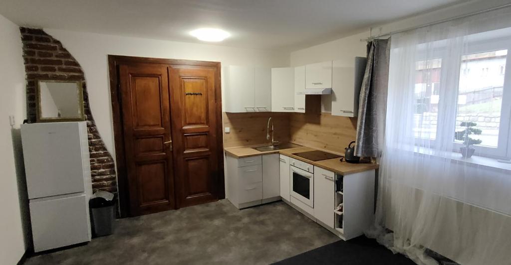 Kuchyň nebo kuchyňský kout v ubytování Apartmány Na Cestě