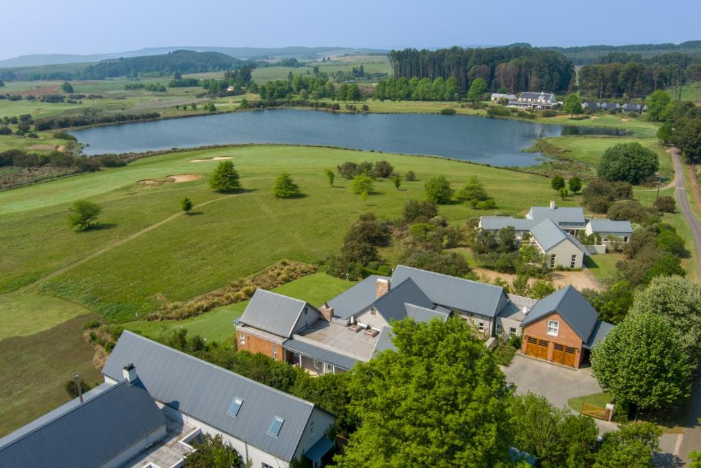 an aerial view of a house with a lake at Prestwick-on-Gowrie, Gowrie Farm, Nottingham Road in Nottingham Road