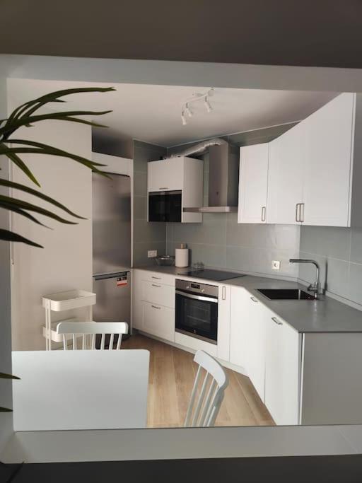 Kuchyň nebo kuchyňský kout v ubytování Apartamento reformado en Urb. Jardines de Zahara