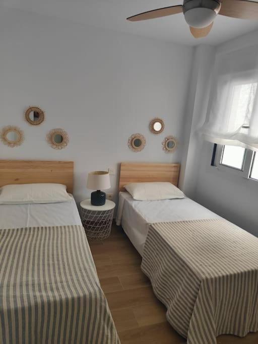 Postel nebo postele na pokoji v ubytování Apartamento reformado en Urb. Jardines de Zahara