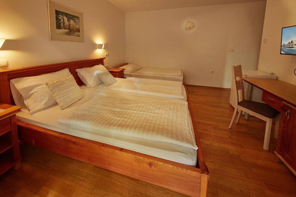 Postel nebo postele na pokoji v ubytování Rute Hotel and Apartments