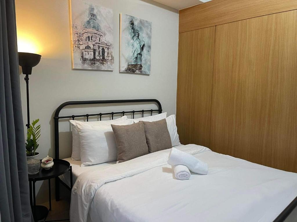 Shell Residences MOA tower D 1BR by darpm