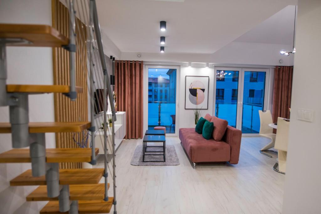Posezení v ubytování Nowoczesny apartament na Warmii i Mazurach z garażem