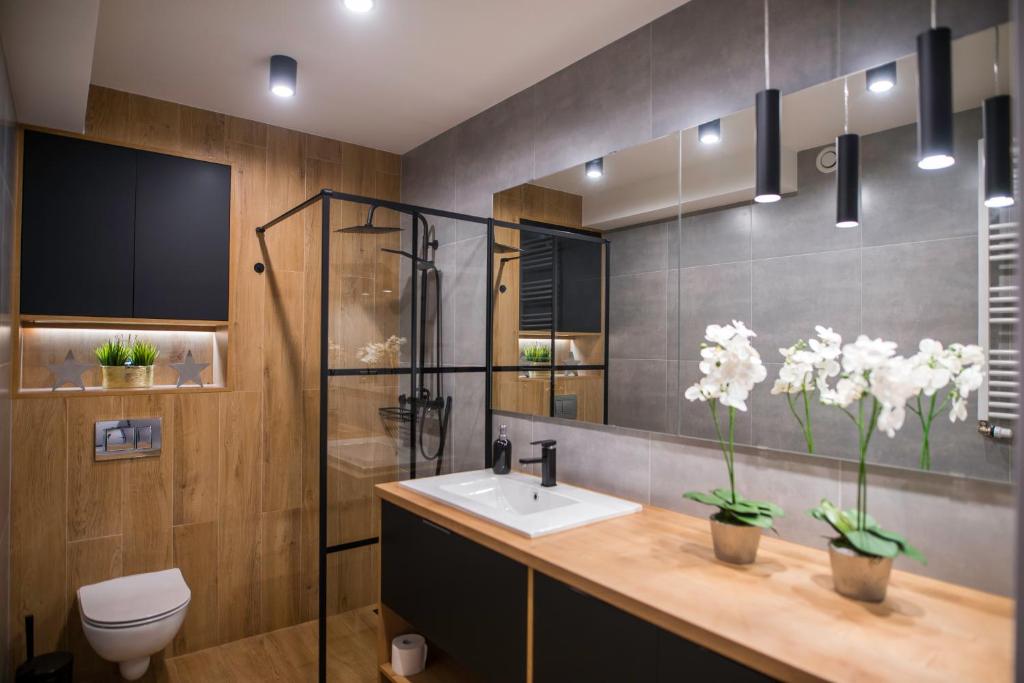 Koupelna v ubytování Nowoczesny apartament na Warmii i Mazurach z garażem