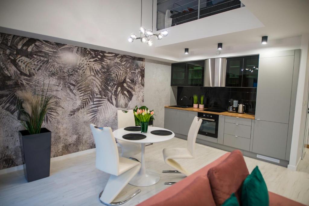 Posezení v ubytování Nowoczesny apartament na Warmii i Mazurach z garażem