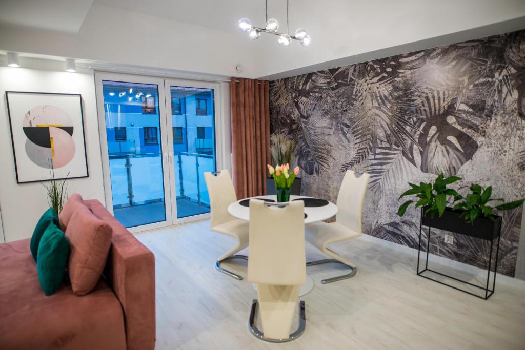 Posezení v ubytování Nowoczesny apartament na Warmii i Mazurach z garażem
