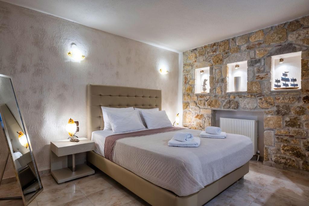 Posteľ alebo postele v izbe v ubytovaní Palmrise Luxury Villas by Travel Pro Services - Nea Skioni Halkidiki