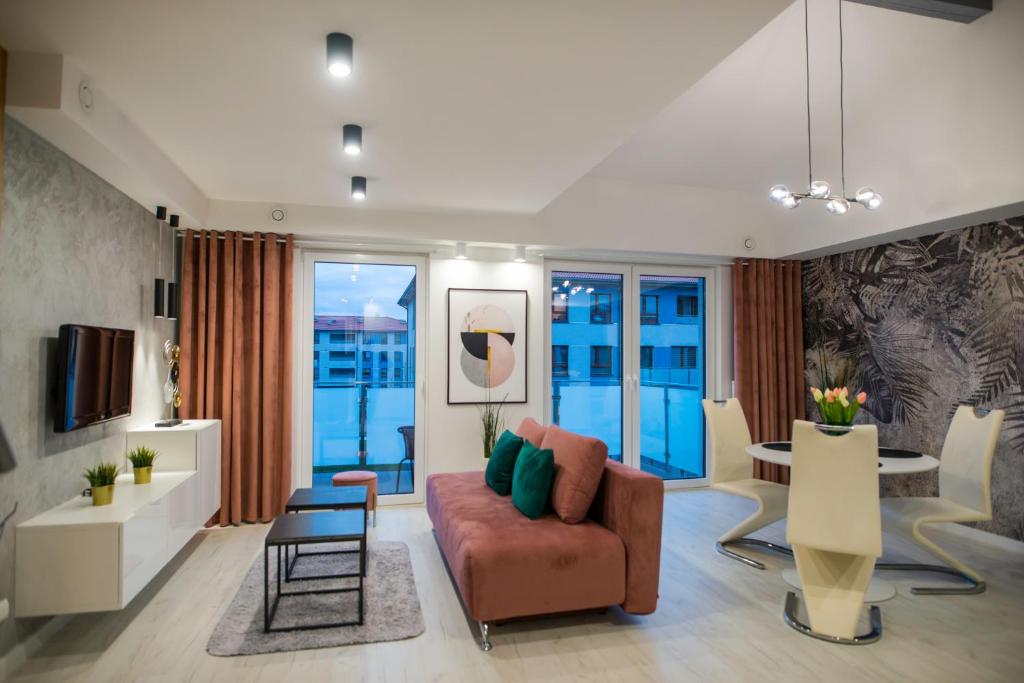 Posezení v ubytování Nowoczesny apartament na Warmii i Mazurach z garażem