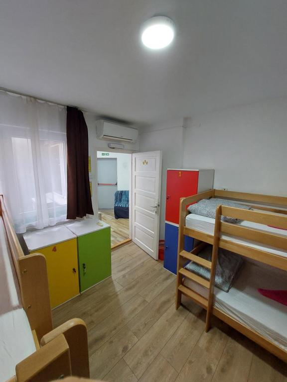 Postel nebo postele na pokoji v ubytování Hostel Inn Downtown