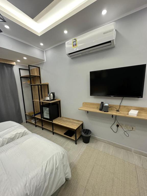 TV a/nebo společenská místnost v ubytování Blue Rose Hotel