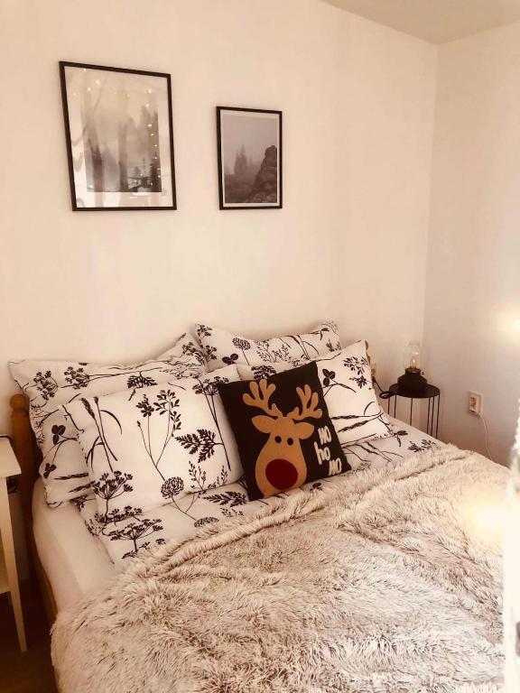 Postel nebo postele na pokoji v ubytování Larix Mátra Vendégház