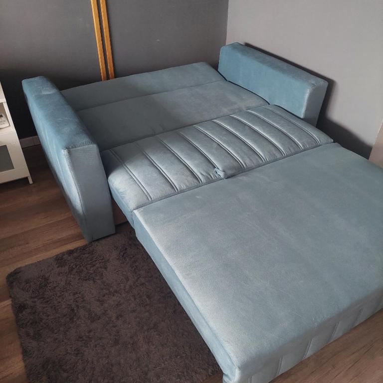 Łóżko lub łóżka w pokoju w obiekcie haJÓ Apartman